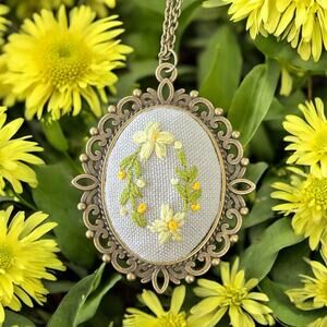 Handmade yellow & White Flower Embroidery Pendant in Antique Bronze Bezel